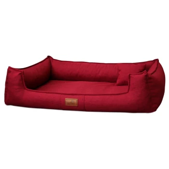 Rotes rechteckiges Haustierbett mit erhöhten Seiten und kleinem passendem Kissen, vorne mit der Aufschrift „tierlando“.