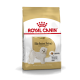 Royal Canin Bichon Frise Adult Hundefutterbeutel, mit einer Illustration eines weißen Bichon Frise Hundes und Text, der die rassespezifische Ernährung hervorhebt.