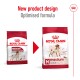 Image of two bags of Royal Canin Medium Adult dog food, showcasing a new product design with the text "New product design" and "Optimised formula."