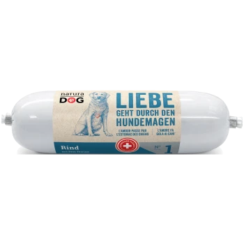 Zylindrische Hundefutterverpackung mit der Bezeichnung "natura DOG" mit einer blauen Hundillustration und Text in Deutsch, Französisch und Italienisch.