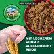 Hundefutteranzeige mit Trockenfutter, rohem Huhn und Weizen, mit "MIT LECKEREM HUHN & VOLLKORNGETREIDE" und "VOLLSTÄNDIGE NÄHRSTOFFE FÜR ARBEITSHUNDE."