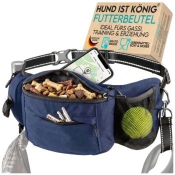 Eine blaue Bauchtasche für Hundebesitzer, mit Fächern für Hundeleckerlis, Schlüssel und einen Tennisball, mit dem sichtbaren Text 'HUND IST KÖNIG'.