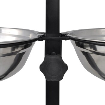 Edelstahl-Doppelschalen für Haustierfutter, montiert auf einem schwarzen Metallständer, mit einem zentralen Einstellknopf.