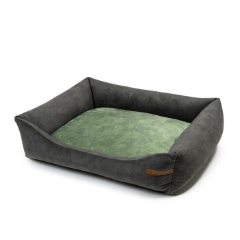 Ein gemütliches Haustierbett mit einem dunkelgrauen Außenmaterial und einem weichen grünen Innenraum, mit einem kleinen braunen Etikett an der Seite.