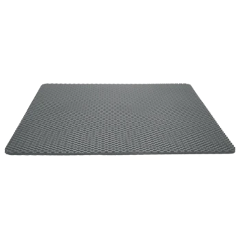 Graue Haustiermatte mit einem strukturierten, wabenförmigen Design, geeignet, um Haustieren Komfort zu bieten.