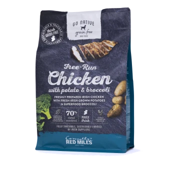 Dog food bag featuring "Go Native Grain Free" with free-run chicken, potatoes, and broccoli. Claims 70% meat content, 100% Irish.