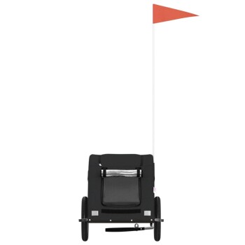 Schwarzer Haustierwagen mit zwei Rädern, einem Stauraum und einer orangefarbenen Sicherheitsflagge auf weißem Hintergrund.