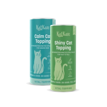 Zwei KatKare-Dosen: grün 'Shiny Cat Topping' und türkis 'Calm Cat Topping' mit Katzenillustrationen und 'Vital-Topping'-Aufschrift.