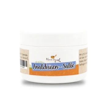 Weißes Glas mit "Analdrüsen-Salbe" von "I love my cat", mit einem bunten Etikett mit Zutaten und Anwendungshinweisen.