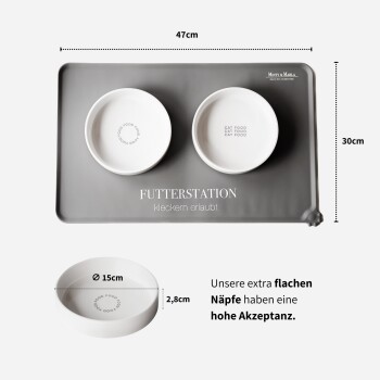 Futterstation für Haustiere mit zwei weißen Schalen, beschriftet mit "KATZENFUTTER" auf einer grauen Matte, Maße 47 cm x 30 cm, mit einem Hinweis zur Schalen-Größe.