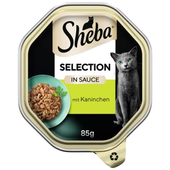 Opakowanie karmy dla kotów Sheba Selection in Sauce z daniem z rozdrobnionego mięsa z ziołami, oznaczone 'mit Kaninchen', 85g.