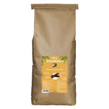 Braune 10-kg-Papiertüte FitNap 'CocoLinos' Kokosleckerlis für Tiere, gelbes Etikett mit der Aufschrift 'CocoLinos', 'Vegan', 'Für Hunde & Pferde'.