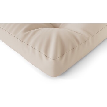 Beiges Haustierbett mit einem plüschigen, gesteppten Design, das eine weiche Textur und abgerundete Ecken zeigt, ideal für den Komfort von Haustieren.