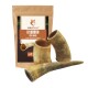 Kuhhorn-Hundekauartikel von Wildfang, verpackt in einer braunen Tüte mit dem Text "KAUHORN FÜR HUNDE" und "COW HORN DOG CHEW."