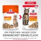 Hill's Science Plan Katzenfutterverpackung mit Tabby- und gestreiften Katzen. Höhepunkte: "Erwachsene 1-6," "Huhn," "Stücke & Soße," und ein neuer Look.