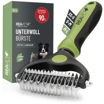 Zweiseitige Unterwollbürste mit ergonomischem grün-schwarzem Griff, in einer Box mit der Aufschrift "REAVET Unterwoll Bürste", reduziert das Haaren um 90%.