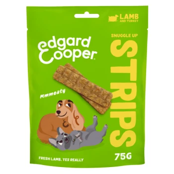 Strips Truthahn und Lamm 75 g Edgard Cooper Snuggle Up Strips Hundeleckerlis Verpackung mit grünem Hintergrund, zwei Leckerli-Streifen und Cartoon-Hunden. Text: "Lamm und Truthahn."