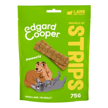 Edgard Cooper Snuggle Up Strips dog treats packaging with green background, two treat strips, and cartoon dogs. Text: "Lamb and Turkey."