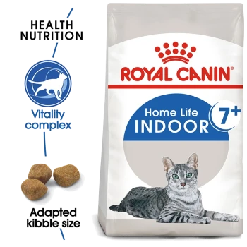 Royal Canin Indoor 7+ cat food bag featuring a gray tabby cat, with text highlighting "Health Nutrition" and "Vitality complex."