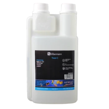 Flasche Silbermann Trace C, ein flüssiges Aquarienergänzungsmittel, mit Anwendungshinweisen und Sicherheitswarnungen auf einem schwarzen Etikett.