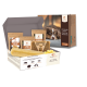 Offene Schachtel Wildfang Hundesnacks mit Käse-Snacks, Käse-Puffs und einem Kauknochen mit Hundeabbildung auf der Verpackung.