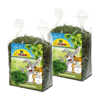 Dwie przezroczyste torby JR FARM Petersilienstiele, wypełnione zielonymi łodygami pietruszki, z rysunkiem kreskówkowego królika i chomika na etykiecie.