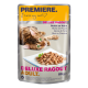Katzenfutterbeutel mit der Aufschrift "PREMIERE. Ich liebe meine Katze" mit einer getigerten Katze und Hühnerstücken in Soße. Text: "DELUXE RAGOUT ADULT, Reich an Huhn."
