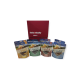 Quatre sachets de friandises pour chats colorés devant une boîte rouge étiquetée "Qualité Suisse" avec le site web delpet.ch.