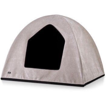 Ein gemütliches, hellgraues Haustierzelt mit einem schwarzen Eingang, entworfen für kleine Tiere, um einen komfortablen Ruheplatz zu bieten.