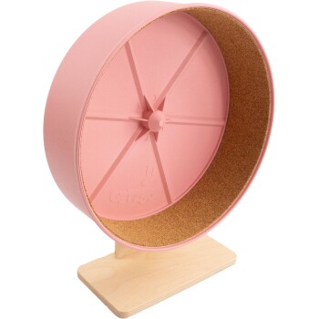 Ein pinkfarbener Trainingsrad für kleine Haustiere, mit einem Kork-Innenraum und einem Holzsockel, mit dem Markenzeichen "Getzo" sichtbar.