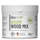 Behälter mit REAVET+ Wurmholz-Mix für Hunde, 20g, mit einem weißen Etikett mit grünem Text und einem Logo für natürliche Inhaltsstoffe.