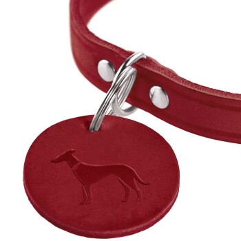 Rotes Lederhundehalsband mit einem runden Anhänger, der eine geprägte Silhouette eines Hundes zeigt.