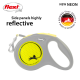 A gray and neon yellow retractable dog leash from Flexi, featuring a reflective side panel and a logo indicating it is made in Germany.