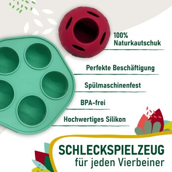 Grüne Silikonform mit 6 Mulden für Leckerlis und roter Gummipuzzleball mit dem deutschen Text 'SCHLECKSPIELZEUG für jeden Vierbeiner'.