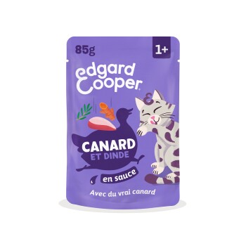 Sachet violet Edgard & Cooper 85 g pour chats (1+) étiqueté « Canard et Dinde en sauce, Avec du vrai canard » avec un chat cartoon souriant.