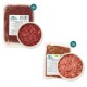 Zwei Pakete Bio-Hundefleisch: "BIO-Rinderfleisch-Mix" (250g) und "BIO-Hühnerhackfleisch" (150g), mit Schalen voller Fleisch.