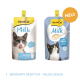 Zwei GimCat Milk‑Beutel (weiß und blau) mit Katzenfotos, der Aufschrift 'GimCat Milk +Calcium' und einem orangefarbenen 'NEU!'-Badge.