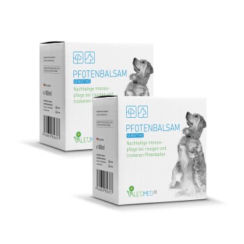 Verpackung für "Pfotenbalsam Sensitive", ein Pfotenbalsam für Hunde, mit einem Hundebild und Text über die intensive Pflege für rissige Pfoten.