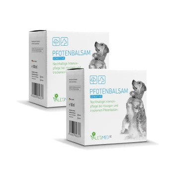 Verpackung für "Pfotenbalsam Sensitive", ein Pfotenbalsam für Hunde, mit einem Hundebild und Text über die intensive Pflege für rissige Pfoten.