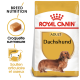 Sac de nourriture pour chiens Royal Canin Adult Dachshund avec une illustration de teckel, avec un texte soulignant la nutrition de la race et le soutien des articulations.