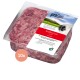 Verpacktes rohes Rindfleisch für Hunde, gekennzeichnet mit "proCani buy nature", mit einem rot-weißen Design und dem deutschen Text "Rindfleisch pur".
