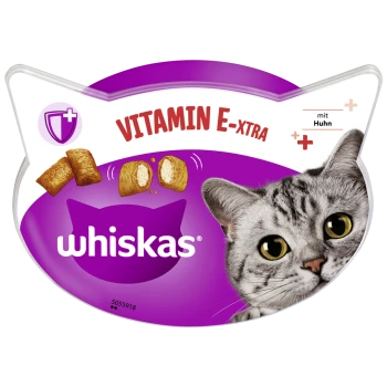 Opakowanie karmy dla kotów Whiskas pokazuje szarego kota tabby, "VITAMIN E-XTRA," "mit Huhn," oraz obrazy chrupiących przysmaków.