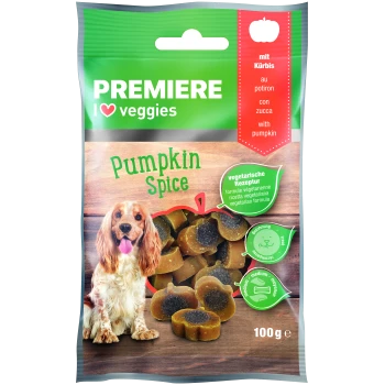 Verpackung für Hundeleckerlis mit einem Cockerspaniel mit herausgestreckter Zunge, beschriftet mit "Pumpkin Spice" und "mit Kürbis," das die vegetarische Formel hervorhebt.
