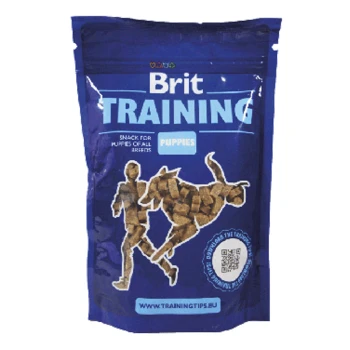 Niebieski worek przysmaków Brit Training dla szczeniąt, z sylwetką osoby i psa, z tekstem 'Przysmak dla szczeniąt wszystkich ras.'