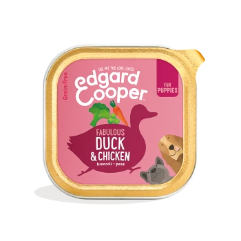 Edgard Cooper grain-free puppy food bag with a pink background, duck silhouette, and "Fabulous Duck & Chicken" text with broccoli and peas.