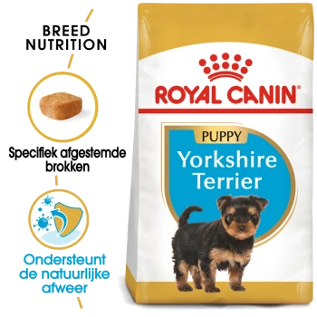 Royal Canin Puppyvoeding voor Yorkshire Terriers, met een afbeelding van een kleine puppy, met tekst die de voeding voor het ras en de ondersteuning van het immuunsysteem benadrukt.