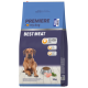Premiere I love my dog Maxi Adult Best Meat dog food bag with 45% poultry, 12kg, and a dog sitting next to a bowl of kibble and meat.