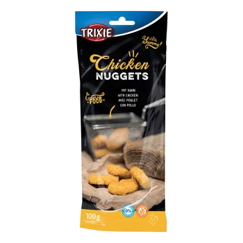 Opakowanie przysmaków dla zwierząt Trixie Chicken Nuggets, z złotymi nuggetami na brązowej powierzchni, z tekstem w wielu językach wskazującym smak kurczaka.