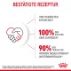 Tierfutteranzeige mit "BESTÄTIGTE REZEPTUR," Handschlag-Icon und Statistiken: "100% ZÜCHTER ZUFRIEDEN*" und "90% WÜRDE EMPFEHLEN**."