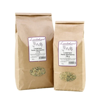 Zwei braune Papiertüten mit Haustierfutter, beschriftet mit "Lunderland Feiner Gemüsemixt" in den Größen 1,5 kg und 750 g, mit einer Illustration einer grünen Kräutermischung.